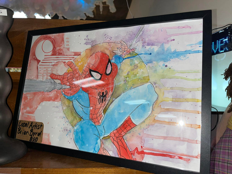 Swingin’ in with color and style! 🎨 Local artist Brian Byrd brought Spider-Man to life in watercolor, 